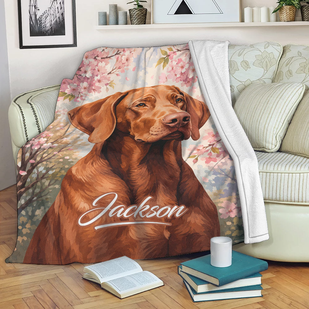 Vizsla dog throw blanket draped over a sofa with soft floral artwork and cozy living room decor