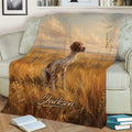 German Shorthaired Pointer blanket draped over a couch with scenic golden grassland artwork