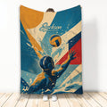 Water polo throw blanket featuring a dynamic player reaching for the ball in bold blue, gold, and red artwork