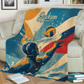Water polo throw blanket styled on a couch with bold geometric colors and an illustrated player in action