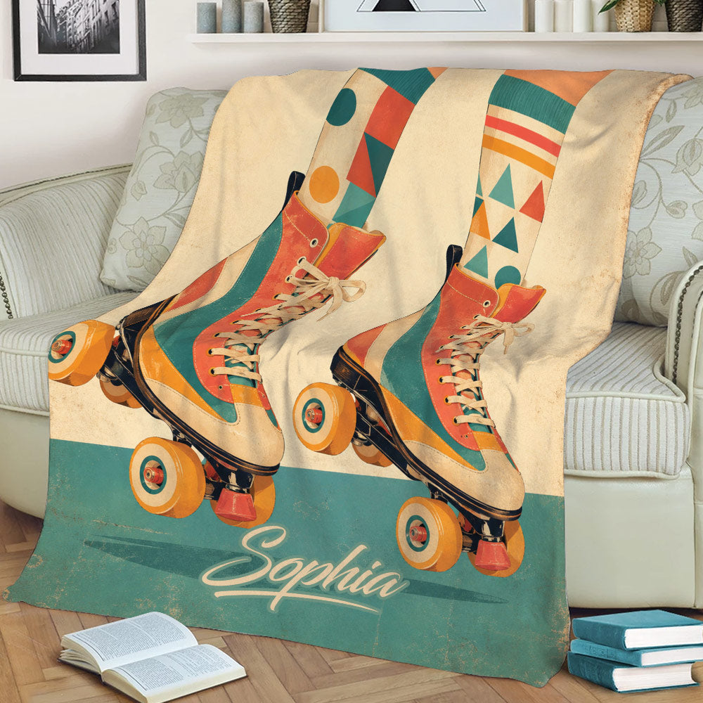 Vintage-inspired roller skate blanket draped over a sofa with vibrant geometric details