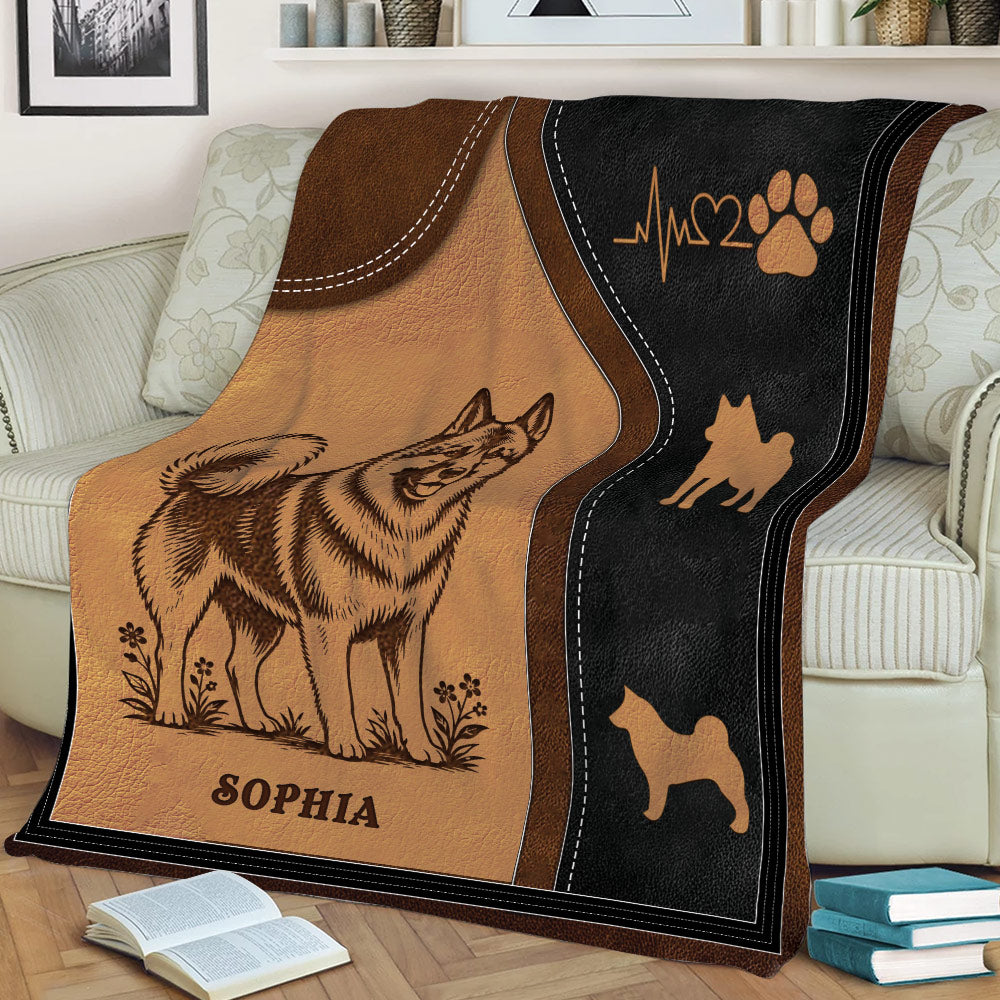 Close view of Norwegian Elkhound throw blanket featuring detailed dog artwork and paw print accents