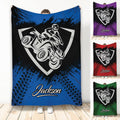 Custom ATV throw blanket with bold quad rider artwork in blue, purple, red, and green color options