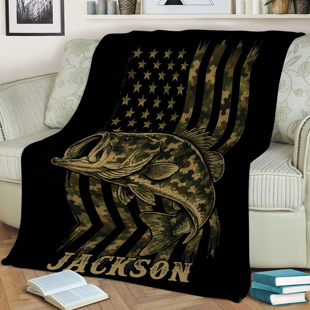 Fishing throw blanket displayed on a couch with a detailed fish, camouflage stripes and star pattern