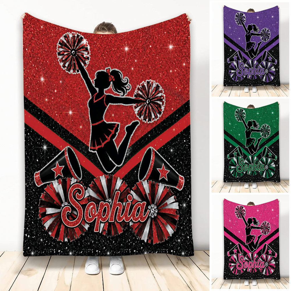 Cheerleading blanket with cheerleader silhouette, pom-poms, megaphones, stars, and bold red and black artwork