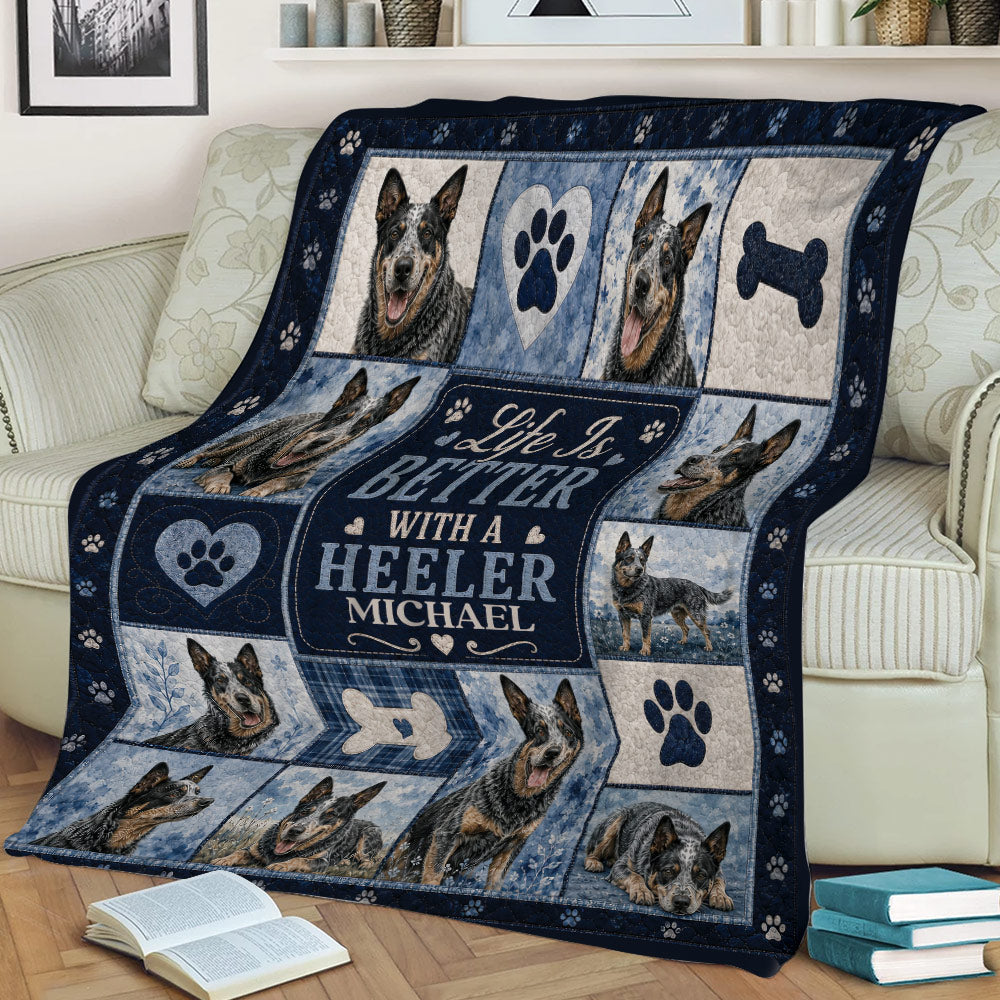 Australian Cattle Dog throw blanket draped over a couch, featuring multiple Heeler portraits and blue tones