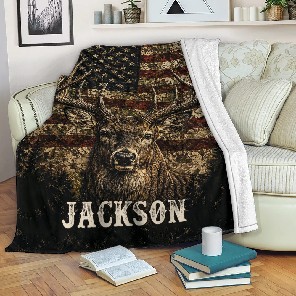 Custom deer throw blanket draped over a sofa with rustic wildlife and flag-inspired artwork