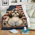 Patriotic Shih Tzu blanket displayed on a couch with stars, stripes, and paw print details