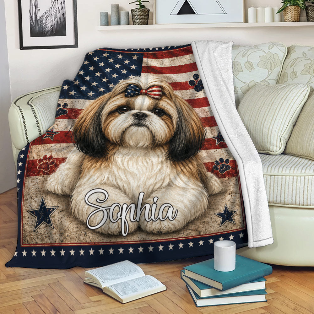 Patriotic Shih Tzu blanket displayed on a couch with stars, stripes, and paw print details