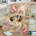 Floral Shih Tzu throw blanket displayed on a sofa with a long-haired dog design