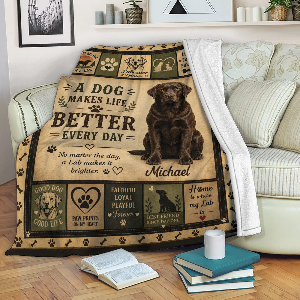 Labrador Retriever blanket displayed on a sofa with rustic dog-themed artwork