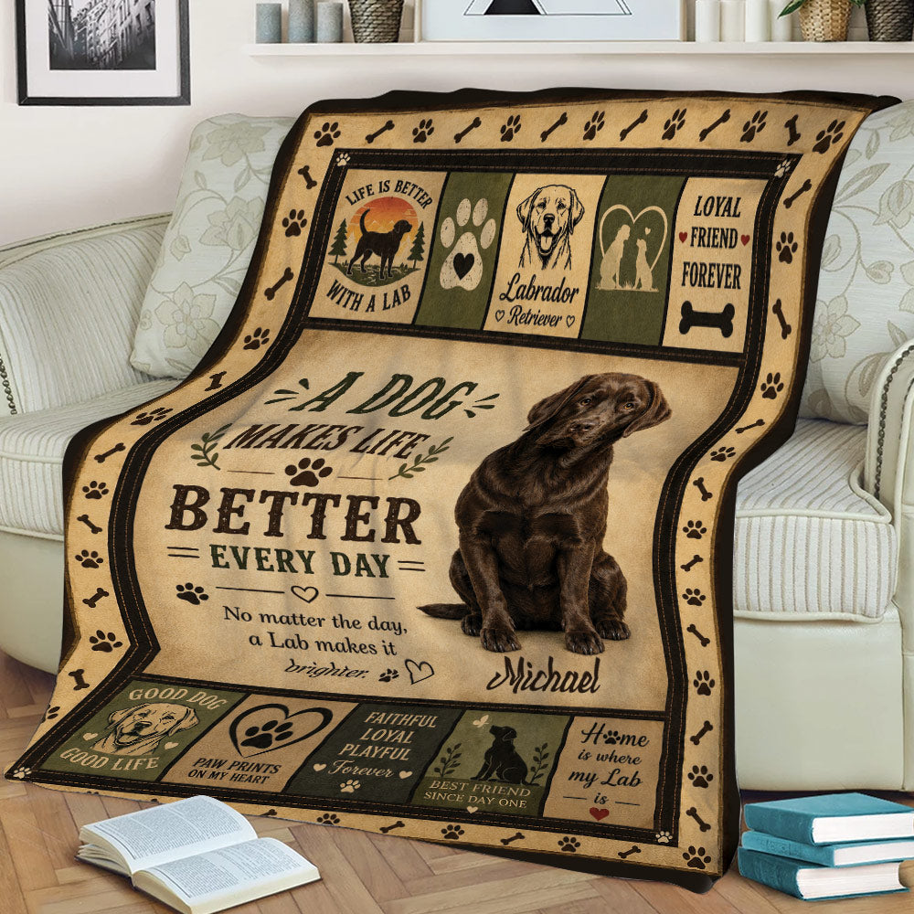 Labrador Retriever throw blanket draped over a sofa with vintage pet artwork