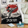 Karate blanket draped over a sofa with martial artist, mountain, torii gate and red sun design