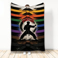 Karate throw blanket featuring a martial artist silhouette and colorful belt artwork