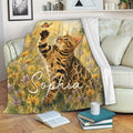 Bengal cat throw blanket draped over a sofa in a cozy living room