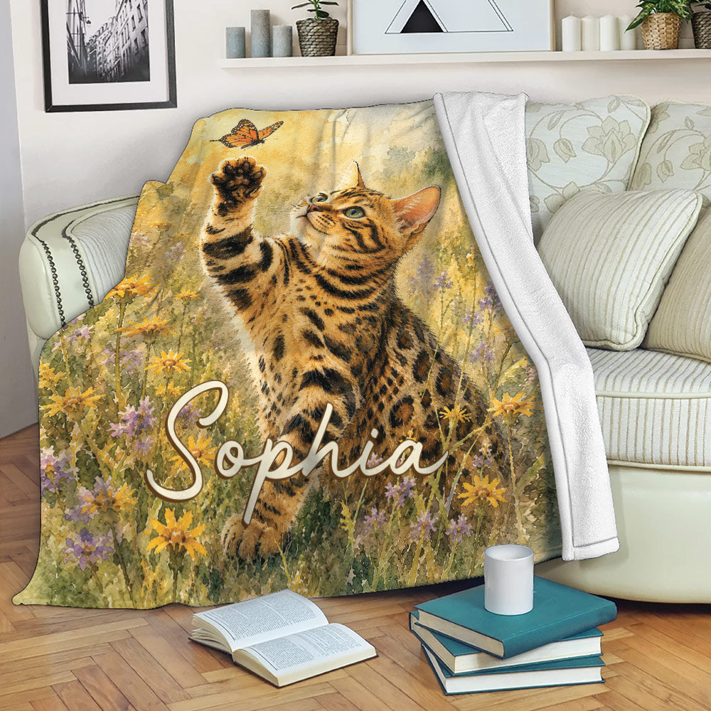 Bengal cat throw blanket draped over a sofa in a cozy living room