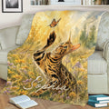 Watercolor Bengal cat blanket displayed on a sofa with wildflower artwork