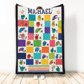 Colorful sign language alphabet blanket with illustrated hand signs and patterned letter panels
