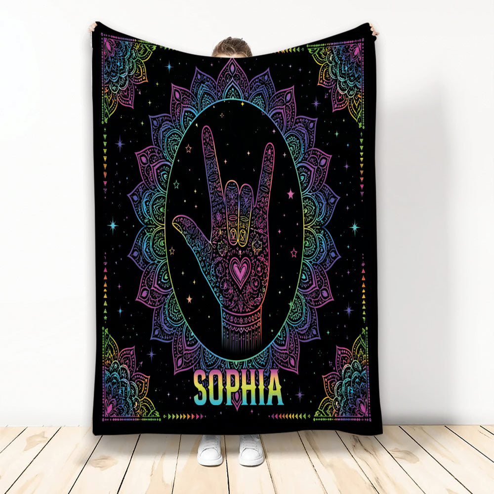 Sign language hand gesture blanket with colorful mandala patterns, stars, and neon-inspired artwork