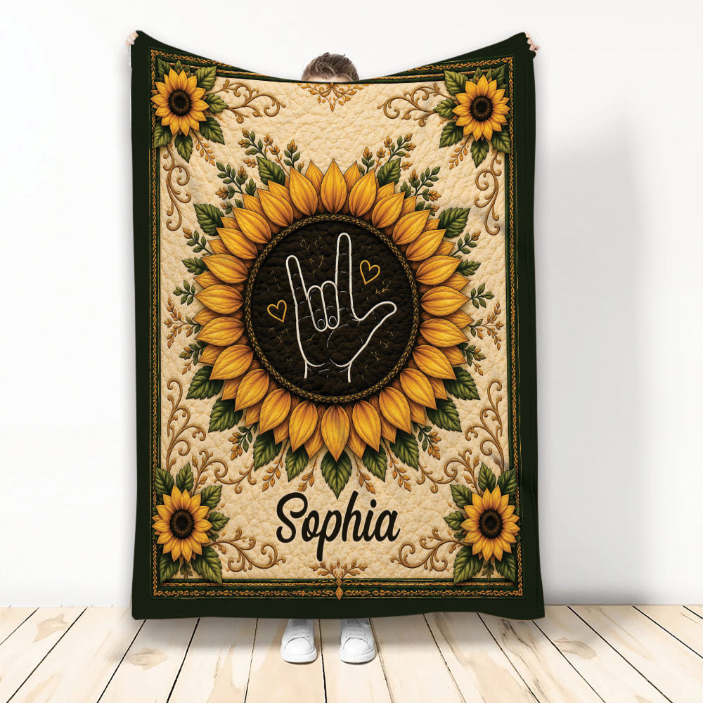 Sign language throw blanket with a hand gesture framed by sunflowers and ornate botanical artwork