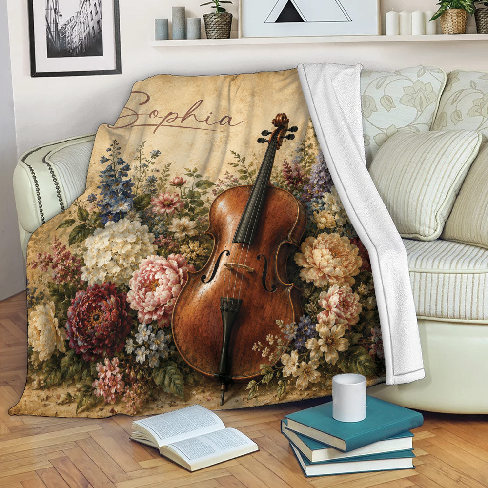 Floral cello throw blanket displayed on a sofa in a cozy reading space