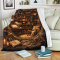 Cozy library throw blanket draped over a sofa with books, flowers, candles, and warm reading nook artwork
