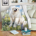 Great Pyrenees throw blanket displayed on a sofa with meadow and flower artwork