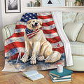 Great Pyrenees throw blanket displayed on a sofa with red, white and blue flag artwork