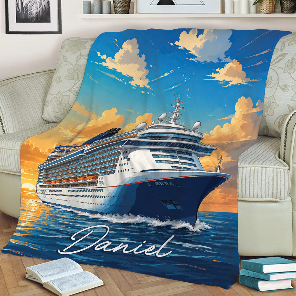 Cruise ship throw blanket displayed on a sofa with ocean waves, blue skies, and warm sunset colors