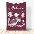 Maroon cruise ship throw blanket featuring palm trees, ocean waves, moonlight, and seagulls