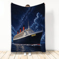 Cruise ship throw blanket displayed against a wall with a starry night sky and ocean artwork