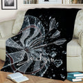 Dart Board Throw Blanket displayed on a sofa with dramatic dartboard target artwork