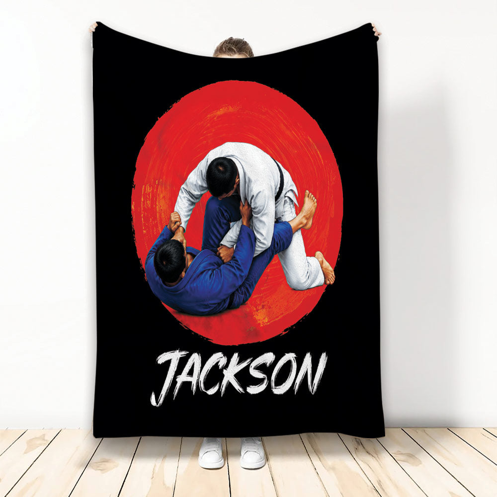 Jiu Jitsu throw blanket with grappling artwork in blue and white uniforms on a red and black background