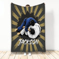 Jiu Jitsu throw blanket featuring two grapplers in blue and white gis with bold black and gold artwork