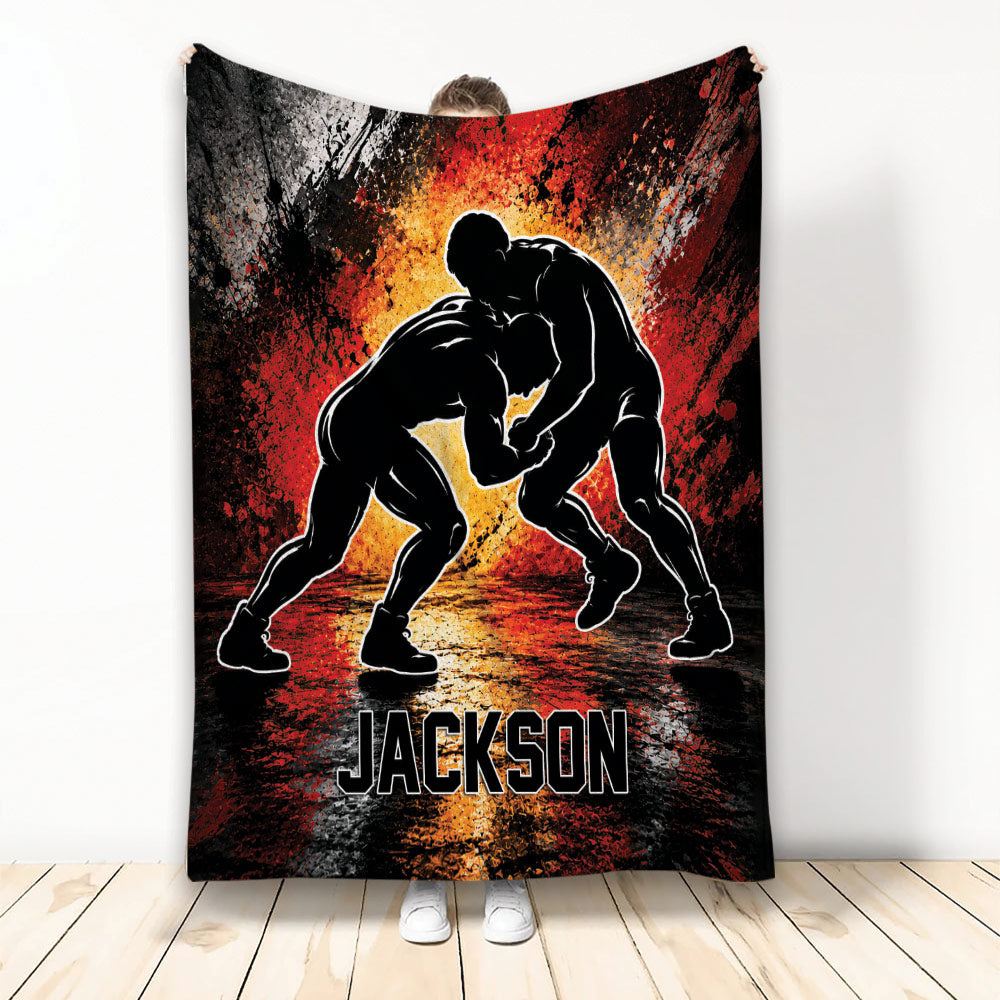 Wrestling throw blanket with two grapplers in a bold black, red, orange and white action design