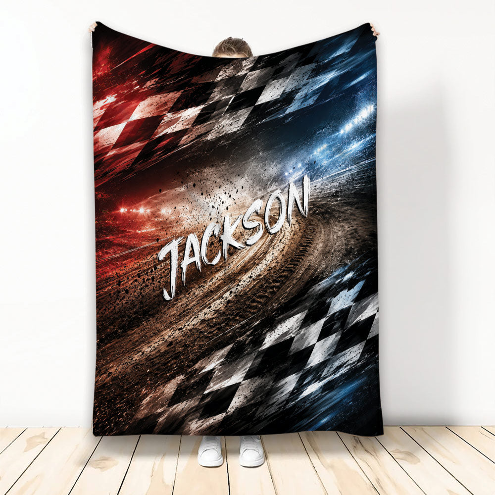 Racing throw blanket with dramatic racetrack artwork, checkered flags, and red, black, and blue accents