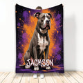 Pitbull throw blanket with bold purple and orange splatter artwork displayed as home decor