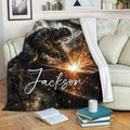 Welder throw blanket draped over a sofa, featuring dramatic welding sparks and dark industrial artwork