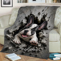 French Bulldog blanket draped over a couch with bold cracked wall and puppy design