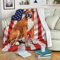 Patriotic Boxer dog blanket displayed on a sofa with bold red, white, and blue artwork
