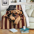 Goldendoodle throw blanket displayed on a sofa with patriotic stars and stripes artwork