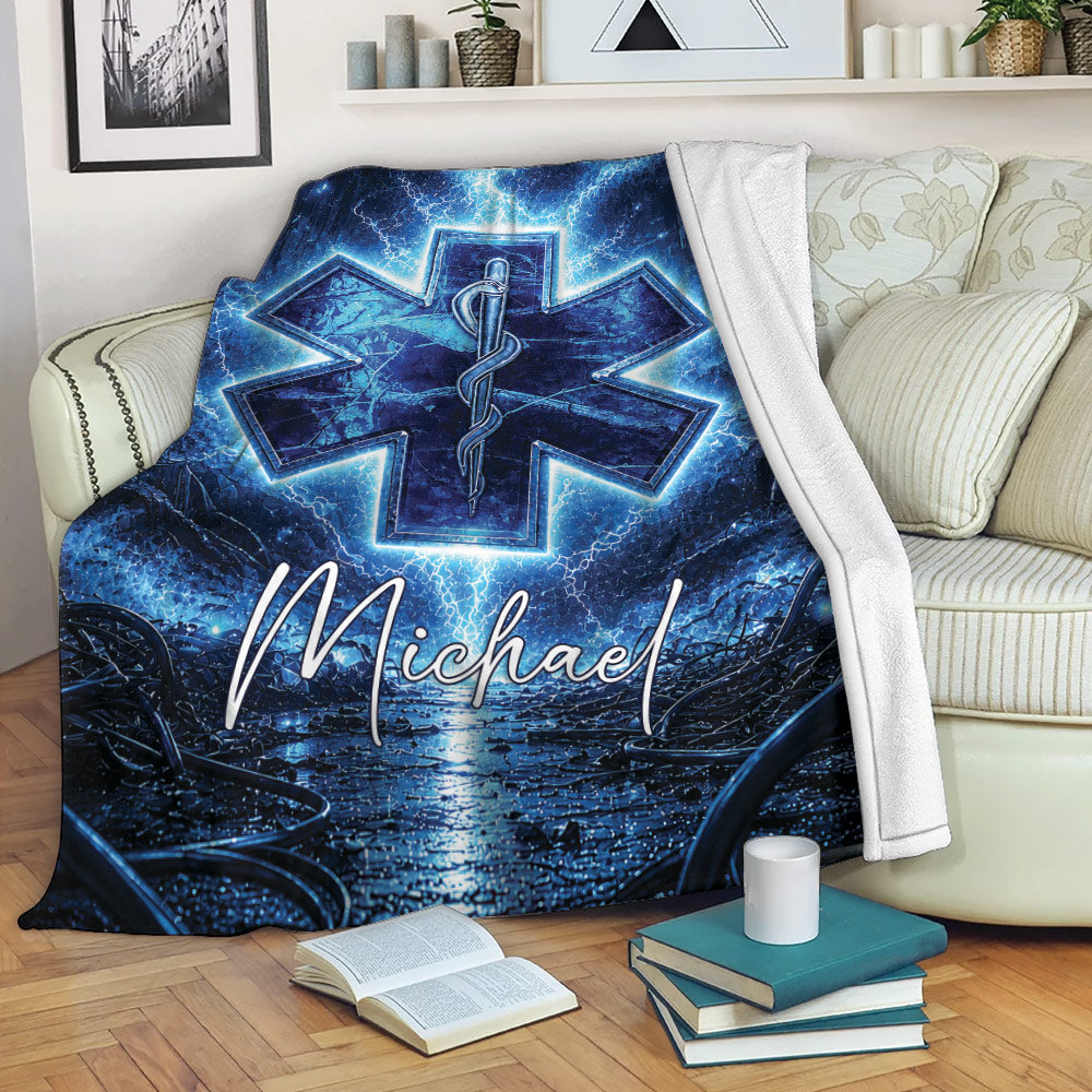 Blue paramedic throw blanket draped over a sofa with dramatic Star of Life medical artwork