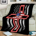 Black paramedic blanket shown on a couch with a red glowing Star of Life and distressed patriotic stripe design
