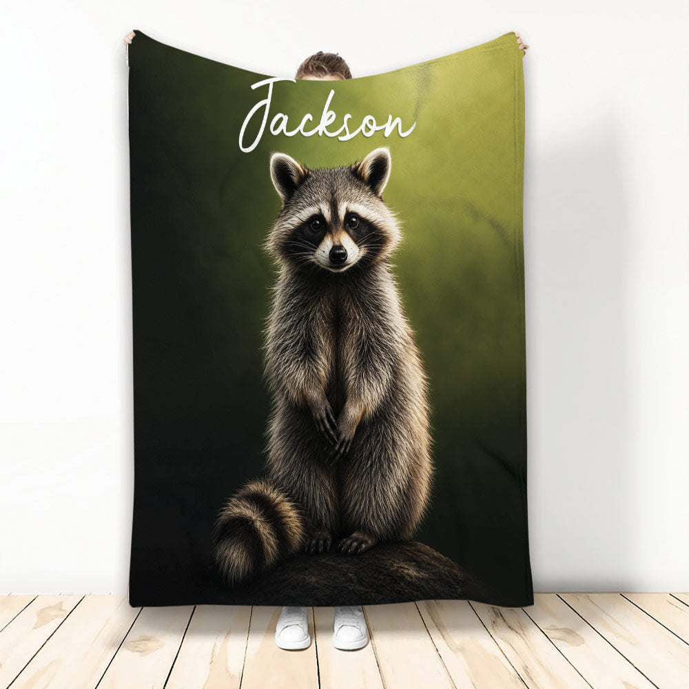 Raccoon throw blanket with realistic woodland artwork in black and green tones
