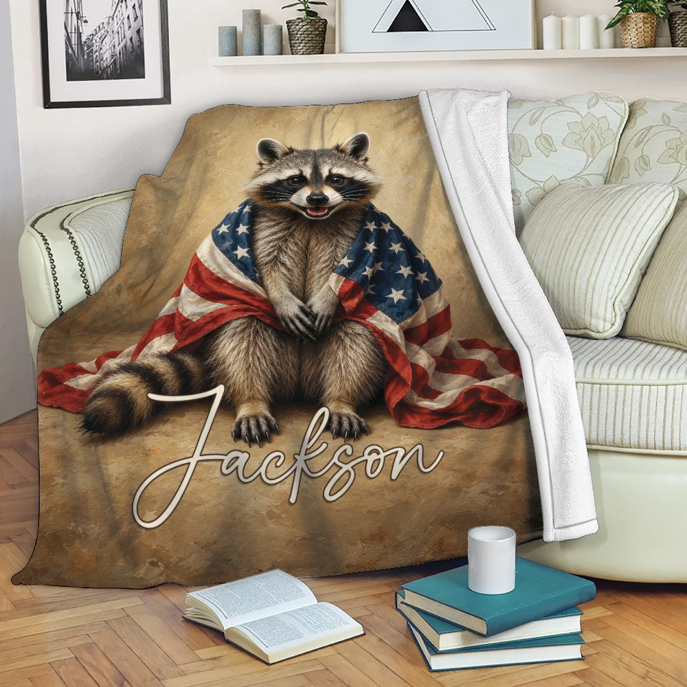 Patriotic raccoon throw blanket draped over a sofa with American flag artwork