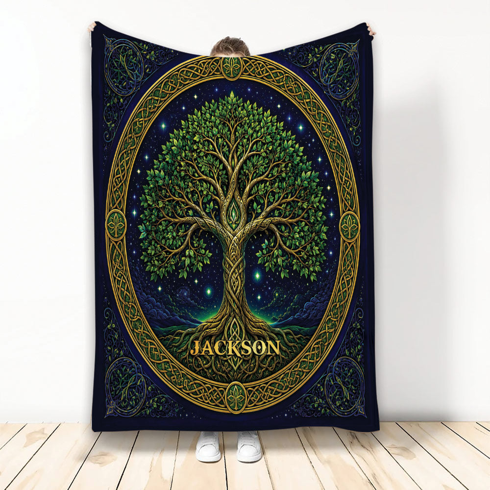 Tree of Life blanket with Celtic-inspired knotwork, leafy branches, starry night sky, and deep blue artwork