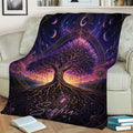 Celestial Tree of Life blanket draped over a couch with glowing roots, moon phases, and purple artwork