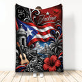 Puerto Rico throw blanket featuring the flag, historic fort, guitar, coquí frog, hibiscus, and coastal scenery
