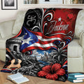 Puerto Rico throw blanket styled on a couch with flag imagery, coastal architecture, tropical flowers, guitar, and coquí frog