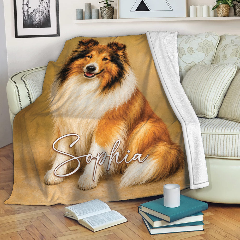 Rough Collie blanket draped over a sofa with detailed dog artwork in a cozy living room setting